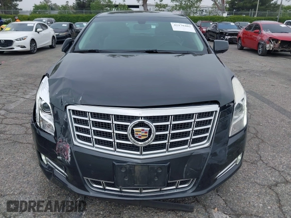 2013 Cadillac XTS Luxury with VIN 2G61P5S33D9215214, listed as a IAAI auction lot 42170402 with 132,045 mi miles and . Bid and sale history available at DreamBid. Image 12.