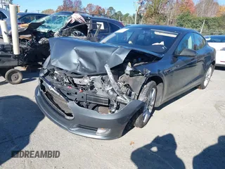 2013 Tesla Model S Performance with VIN 5YJSA1DP7DFP11737, listed as a IAAI auction lot 40915195 with Not provided miles and . Bid and sale history available at DreamBid. Image 16.