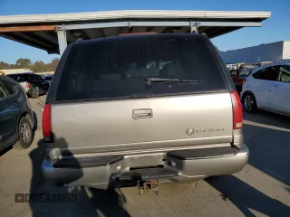 2000 Cadillac Escalade z VIN 1GYEK13R5YR107157, wystawiony jako Copart lot #89024795 z przebiegiem 172 599 mil mil oraz Szkody całkowita. Historia ofert i sprzedaży dostępna na DreamBid. Obrazek 6.