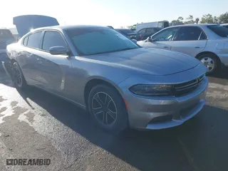 2015 Dodge Charger SE with VIN 2C3CDXBG2FH775932, listed as a IAAI auction lot 42011454 with 154,632 mi miles. Bid and sale history available at carsss.com. Image 1.
