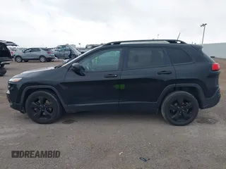 2017 Jeep Cherokee Sport z VIN 1C4PJLAB2HW641124, wystawiony jako IAAI lot #42155679 z przebiegiem 130 556 mil mil oraz . Historia ofert i sprzedaży dostępna na DreamBid. Obrazek 14.