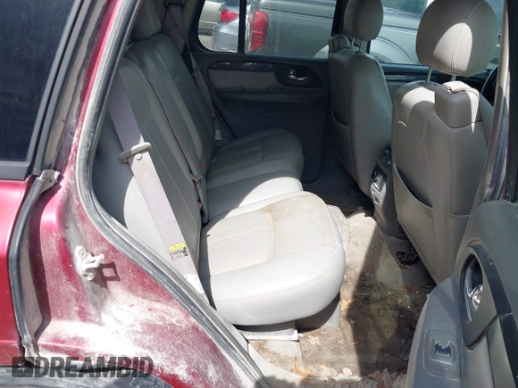 2006 GMC Envoy SLE z VIN 1GKDS13S362314323, wystawiony jako IAAI lot #42476958 z przebiegiem 164 322 mil mil oraz . Historia ofert i sprzedaży dostępna na DreamBid. Obrazek 8.