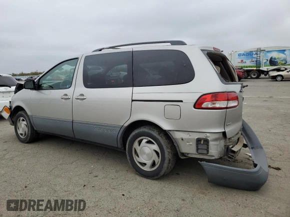 2001 Toyota Sienna LE with VIN 4T3ZF13C71U399066, listed as a Copart auction lot 85601134 with 81,233 mi miles and Salvage Title. Bid and sale history available at carsss.com. Image 2.