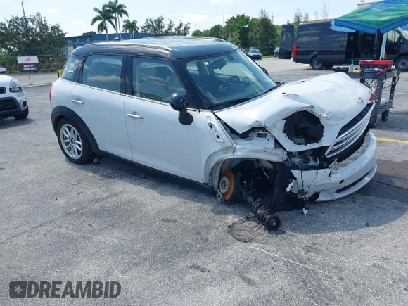 2015 MINI Countryman z VIN WMWZB3C53FWR43884, wystawiony jako IAAI lot #42336430 z przebiegiem 111 934 mil mil oraz . Historia ofert i sprzedaży dostępna na DreamBid. Obrazek 1.