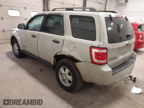 2008 Ford Escape XLT with VIN 1FMCU93128KC67338, listed as a IAAI auction lot 42099606 with 188,817 mi miles. Bid and sale history available at carsss.com. Image 3.