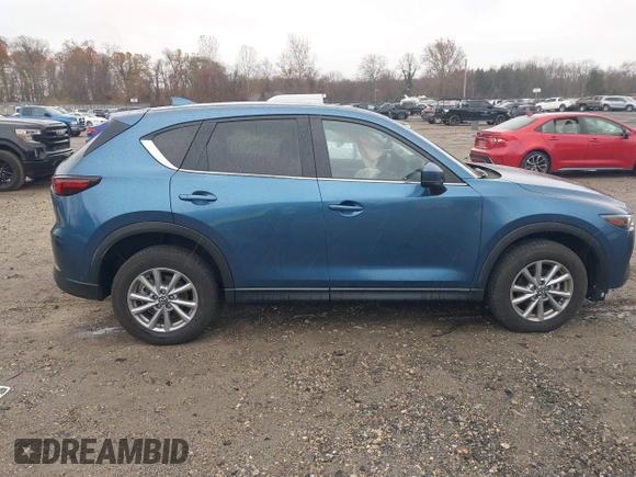 2023 Mazda CX-5 S Carbon Edition z VIN JM3KFBCM4P0264891, wystawiony jako IAAI lot #40933700 z przebiegiem 18 714 mil mil oraz . Historia ofert i sprzedaży dostępna na DreamBid. Obrazek 13.