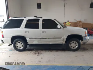 2004 GMC Yukon SLE z VIN 1GKEC13V64R107506, wystawiony jako IAAI lot #41407353 z przebiegiem 215 127 mil mil oraz . Historia ofert i sprzedaży dostępna na DreamBid. Obrazek 13.