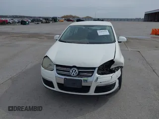 2008 Volkswagen Jetta Sedan S with VIN 3VWJZ71K58M075639, listed as a IAAI auction lot 41855222 with 142,902 mi miles. Bid and sale history available at carsss.com. Image 6.