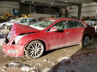 2013 Cadillac XTS Platinum with VIN 2G61V5S39D9197596, listed as a Copart auction lot 48165765 with 157,777 mi miles and Salvage Title. Bid and sale history available at carsss.com. Image 1.
