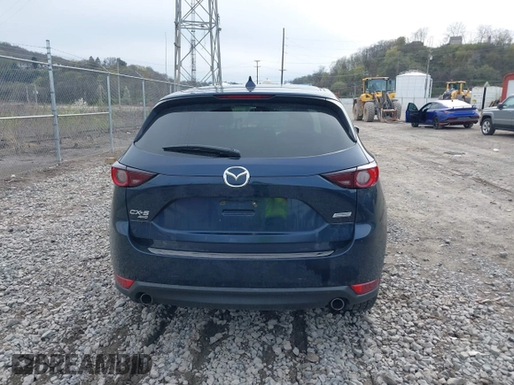 2019 Mazda CX-5 Touring with VIN JM3KFBCM5K0689948, listed as a IAAI auction lot 41976266 with 74,812 mi miles. Bid and sale history available at carsss.com. Image 16.