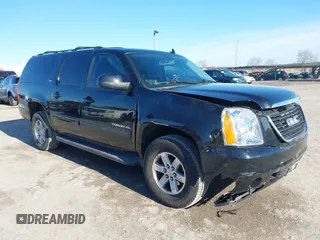 2011 GMC Yukon XL SLT with VIN 1GKS2KE39BR194094, listed as a IAAI auction lot 41610745 with 106,920 mi miles. Bid and sale history available at carsss.com. Image 1.