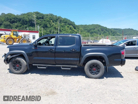 2019 Toyota Tacoma SR with VIN 5TFCZ5AN4KX208354, listed as a IAAI auction lot 42771410 with 77,509 mi miles and . Bid and sale history available at DreamBid. Image 15.