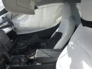 2022 Tesla Model 3 Performance z VIN 5YJ3E1EC9NF337945, wystawiony jako IAAI lot #41419561 z przebiegiem Nie podano mil oraz . Historia ofert i sprzedaży dostępna na DreamBid. Obrazek 5.