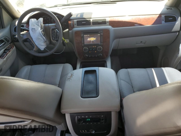 2013 Chevrolet Suburban LT with VIN 1GNSCJE06DR140058, listed as a Copart auction lot 56317995 with 124,345 mi miles and Salvage title. Bid and sale history available at DreamBid. Image 8.