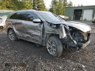 2016 Kia Sorento SXL z VIN 5XYPKDA16GG001293, wystawiony jako Copart lot #85128944 z przebiegiem 121 180 mil mil oraz Szkoda całkowita • Salvage title. Historia ofert i sprzedaży dostępna na DreamBid. Obrazek 4.