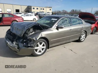 2004 Infiniti Q45 z VIN JNKBF01AX4M500632, wystawiony jako Copart lot #87741405 z przebiegiem 188 505 mil mil oraz Szkody całkowita. Historia ofert i sprzedaży dostępna na DreamBid. Obrazek 1.