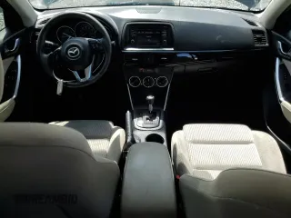 2014 Mazda CX-5 Touring z VIN JM3KE2CY8E0326988, wystawiony jako Copart lot #60473715 z przebiegiem 231 055 mil mil oraz Czysty tytuł • Clean title. Historia ofert i sprzedaży dostępna na DreamBid. Obrazek 8.