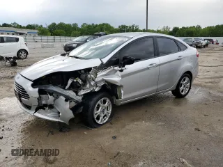 2016 Ford Fiesta SE z VIN 3FADP4BJXGM149197, wystawiony jako Copart lot #57100405 z przebiegiem 106 429 mil mil oraz Nie do naprawy • Non repairable. Historia ofert i sprzedaży dostępna na DreamBid. Obrazek 1.