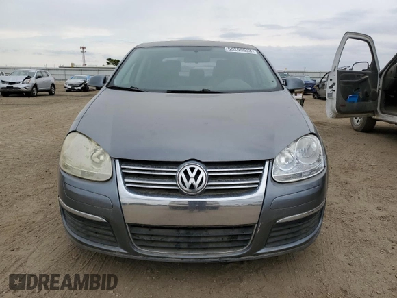 2006 Volkswagen Jetta z VIN 3VWDG71K66M748387, wystawiony jako Copart lot #55269553 z przebiegiem 141 937 mil mil oraz Czysty tytuł • Clean title. Historia ofert i sprzedaży dostępna na DreamBid. Obrazek 5.