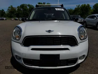 2014 MINI Countryman S z VIN WMWZC5C51EWP35221, wystawiony jako Copart lot #58718545 z przebiegiem 152 809 mil mil oraz Tytuł czysty. Historia ofert i sprzedaży dostępna na DreamBid. Obrazek 5.