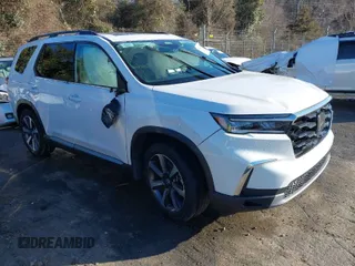 2024 Honda Pilot Touring z VIN 5FNYG2H7XRB016877, wystawiony jako IAAI lot #41496013 z przebiegiem 18 213 mil mil oraz . Historia ofert i sprzedaży dostępna na DreamBid. Obrazek 1.