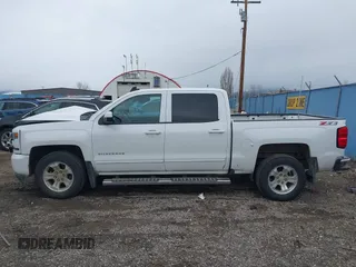 2018 Chevrolet Silverado 1500 LT with VIN 3GCUKREC0JG594914, listed as a IAAI auction lot 41735134 with 98,407 mi miles. Bid and sale history available at carsss.com. Image 14.