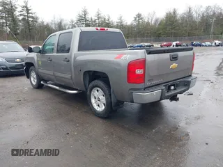 2013 Chevrolet Silverado 1500 LT with VIN 3GCPKSE75DG275651, listed as a IAAI auction lot 41805883 with 142,729 mi miles. Bid and sale history available at carsss.com. Image 3.