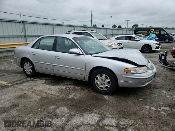 2002 Buick Regal LS with VIN 2G4WB52K321285571, listed as a Copart auction lot 57562465 with 91,352 mi miles and Salvage title. Bid and sale history available at DreamBid. Image 13.
