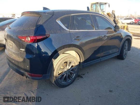 2019 Mazda CX-5 Signature with VIN JM3KFBEY5K0656965, listed as a IAAI auction lot 41421453 with 99,073 mi miles. Bid and sale history available at carsss.com. Image 4.
