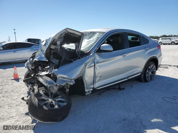 2018 BMW X4 xDrive28i with VIN 5UXXW3C53J0T81767, listed as a Copart auction lot 87806975 with NaN miles and Salvage Title. Bid and sale history available at carsss.com. Image 1.
