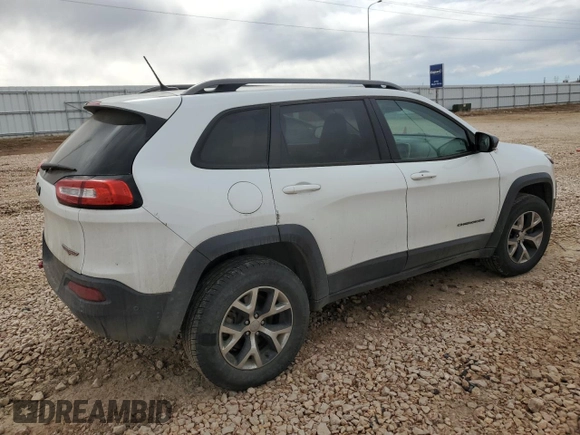 2014 Jeep Cherokee Trailhawk with VIN 1C4PJMBS7EW183855, listed as a Copart auction lot 46143085 with 146,901 mi miles and Salvage Title. Bid and sale history available at DreamBid. Image 3.