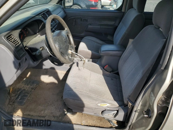 2000 Nissan Frontier XE with VIN 1N6ED27T8YC393355, listed as a Copart auction lot 49607575 with 241,813 mi miles and Salvage title. Bid and sale history available at DreamBid. Image 7.