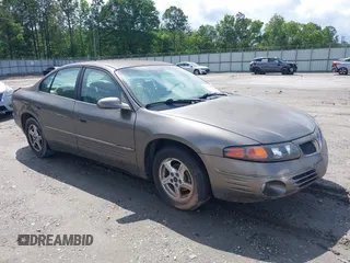 2001 Pontiac Bonneville SE z VIN 1G2HX54K514263686, wystawiony jako IAAI lot #42373637 z przebiegiem Nie podano mil oraz . Historia ofert i sprzedaży dostępna na DreamBid. Obrazek 1.