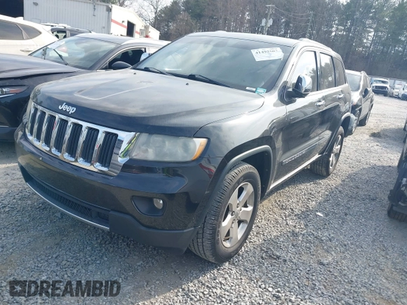 2013 Jeep Grand Cherokee Limited with VIN 1C4RJEBGXDC520609, listed as a IAAI auction lot 41493503 with 173,020 mi miles. Bid and sale history available at carsss.com. Image 2.