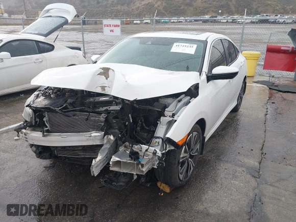 2020 Honda Civic EX-L with VIN 19XFC1F7XLE208720, listed as a IAAI auction lot 41725235 with 70,794 mi miles and . Bid and sale history available at DreamBid. Image 2.