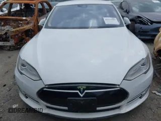 2016 Tesla Model S 90D with VIN 5YJSA1E40GF123543, listed as a IAAI auction lot 42111603 with 126,445 mi miles and . Bid and sale history available at DreamBid. Image 11.