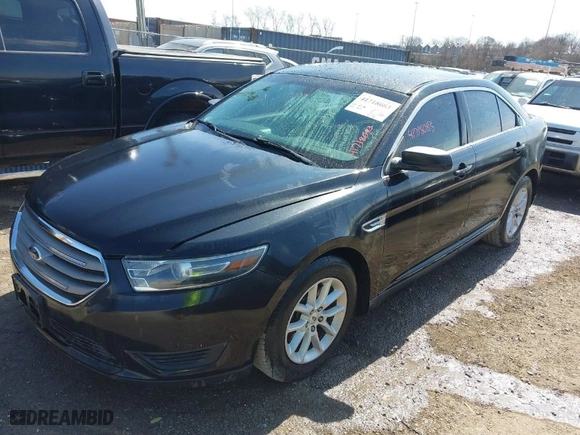 2014 Ford Taurus SE with VIN 1FAHP2D99EG165035, listed as a IAAI auction lot 41718083 with 184072 miles. Bid and sale history available at carsss.com. Image 2.