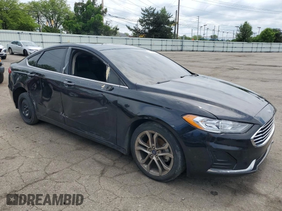 2020 Ford Fusion SEL with VIN 3FA6P0CD9LR136772, listed as a Copart auction lot 56256035 with 125,929 mi miles and Clean title. Bid and sale history available at DreamBid. Image 4.