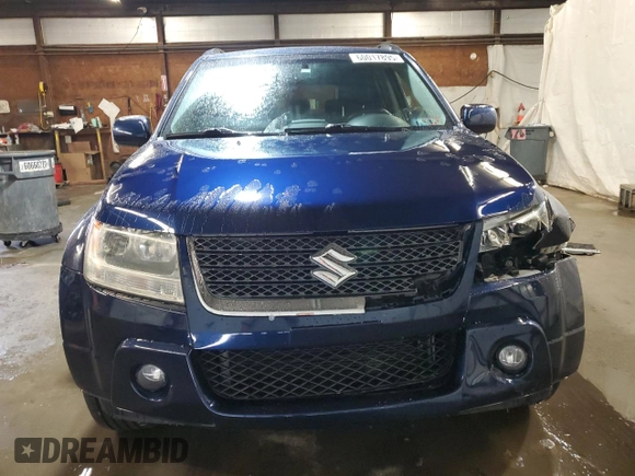 2012 Suzuki Grand Vitara Limited z VIN JS3TD0D77C4101382, wystawiony jako Copart lot #60017895 z przebiegiem 118 024 mil mil oraz Szkoda całkowita • Salvage title. Historia ofert i sprzedaży dostępna na DreamBid. Obrazek 5.