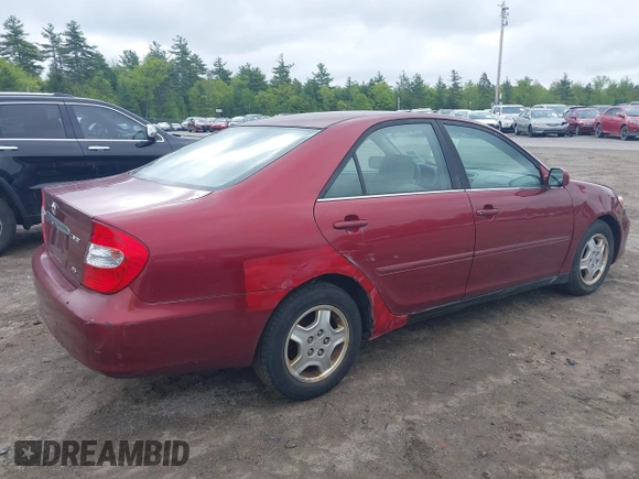 2003 Toyota Camry LE z VIN 4T1BF32K63U050174, wystawiony jako IAAI lot #42260843 z przebiegiem 210 486 mil mil oraz . Historia ofert i sprzedaży dostępna na DreamBid. Obrazek 12.