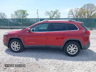 2014 Jeep Cherokee Altitude with VIN 1C4PJMCB7EW185958, listed as a IAAI auction lot 42002583 with 118,256 mi miles and . Bid and sale history available at DreamBid. Image 14.