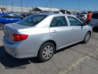 2009 Toyota Corolla with VIN JTDBL40E09J007038, listed as a IAAI auction lot 41830758 with 292,897 mi miles. Bid and sale history available at carsss.com. Image 4.