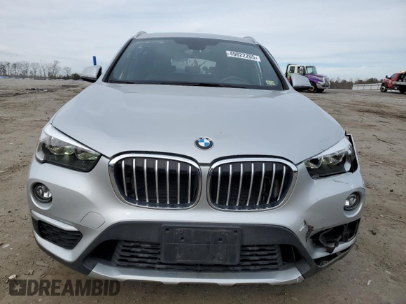 2018 BMW X1 sDrive28i with VIN WBXHU7C3XJ5H38873, listed as a Copart auction lot 49822205 with 46,847 mi miles and Salvage Title. Bid and sale history available at carsss.com. Image 5.