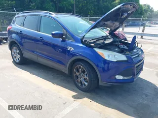 2014 Ford Escape SE z VIN 1FMCU9GX3EUA57023, wystawiony jako IAAI lot #42423490 z przebiegiem 183 255 mil mil oraz . Historia ofert i sprzedaży dostępna na DreamBid. Obrazek 1.