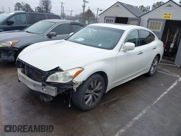 2013 Infiniti M with VIN JN1BY1AP2DM511813, listed as a IAAI auction lot 41577968 with 191,608 mi miles and . Bid and sale history available at DreamBid. Image 2.