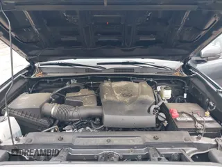 2022 Toyota Tacoma SR with VIN 3TMCZ5AN2NM507478, listed as a IAAI auction lot 42425907 with 40,796 mi miles and . Bid and sale history available at DreamBid. Image 10.