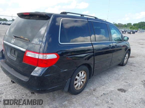 2007 Honda Odyssey Touring z VIN 5FNRL38827B059573, wystawiony jako IAAI lot #42261125 z przebiegiem 214 954 mil mil oraz . Historia ofert i sprzedaży dostępna na DreamBid. Obrazek 4.