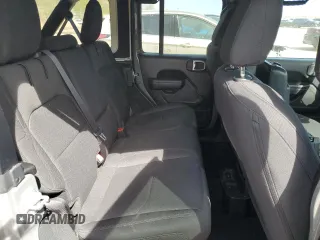 2023 Jeep Wrangler z VIN 1C4JJXN61PW623013, wystawiony jako Copart lot #54681425 z przebiegiem 26 574 mil mil oraz Czysty tytuł • Clean title. Historia ofert i sprzedaży dostępna na DreamBid. Obrazek 11.