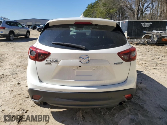 2016 Mazda CX-5 Grand Touring with VIN JM3KE4DY6G0857197, listed as a Copart auction lot 44500955 with 76,088 mi miles and Salvage Title. Bid and sale history available at DreamBid. Image 6.