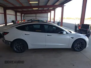 2021 Tesla Model 3 Long Range with VIN 5YJ3E1EB3MF003027, listed as a IAAI auction lot 41859036 with 102,302 mi miles and . Bid and sale history available at carsss.com. Image 14.